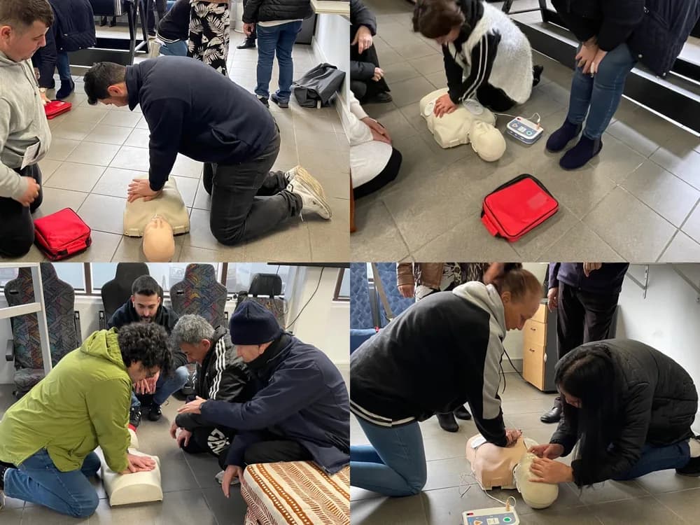Skylight Buslines drivers practising CPR and first-aid technique during a training session