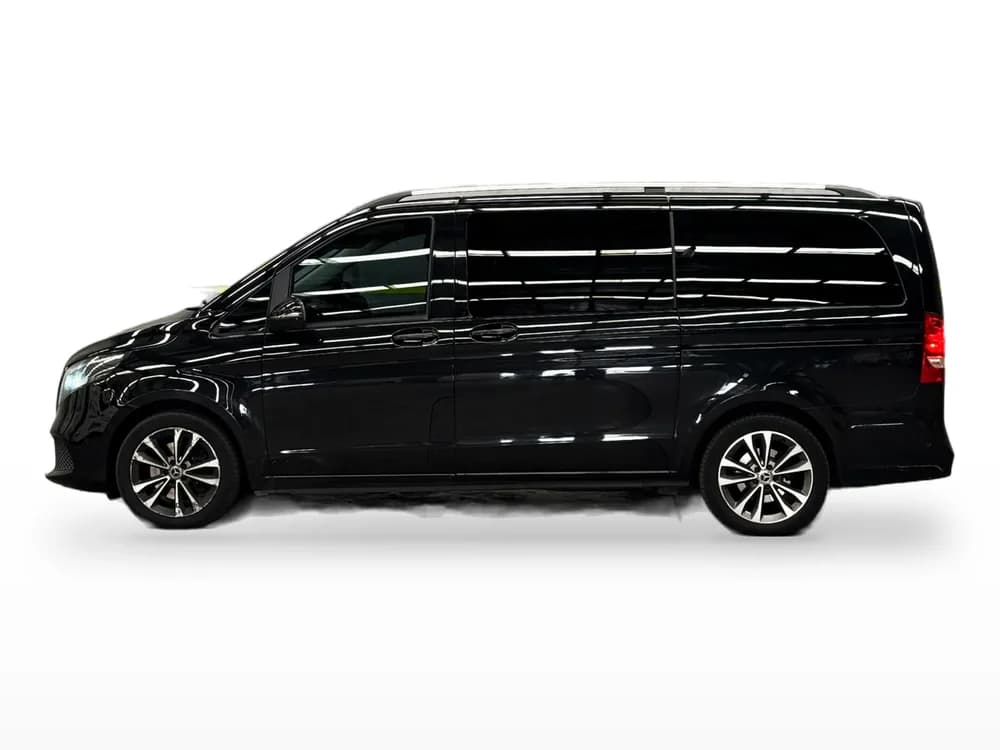 The Skylight Buslines Mercedes-Benz V-Class in black — the long-wheelbase people mover used for VIP and executive transfers